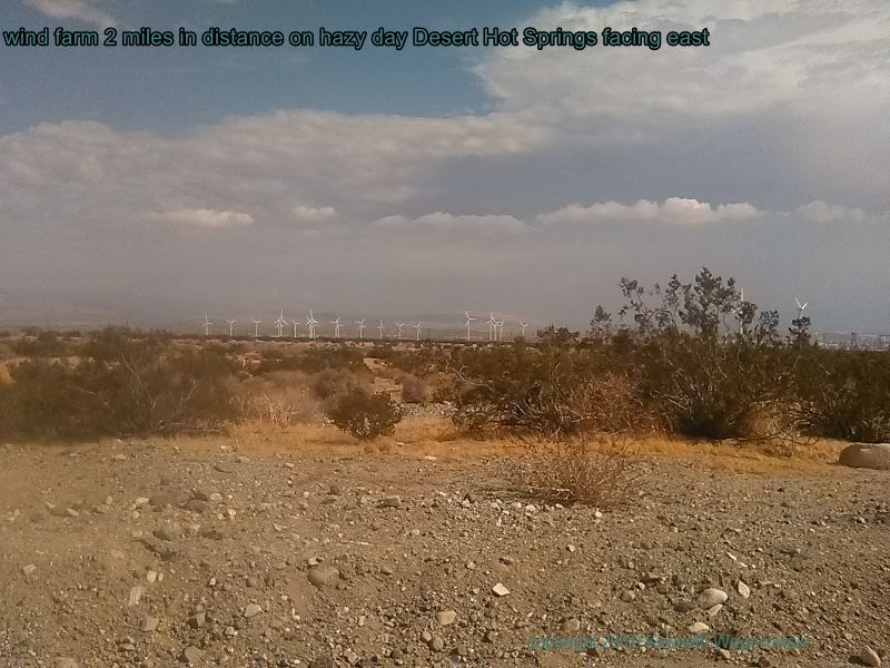 Wind farm shows how bright white and stark these turbines can be when day is hazy